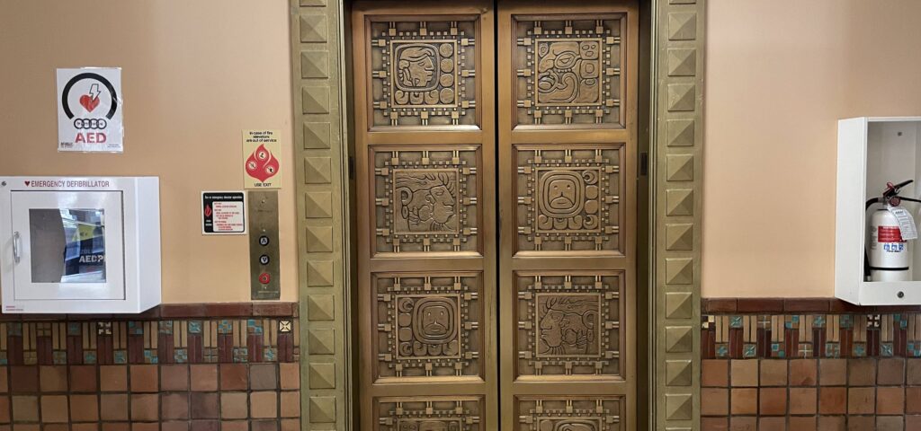 Decorative Art Deco elevator doors inside the historic Hall of Waters in Excelsior Springs, Missouri