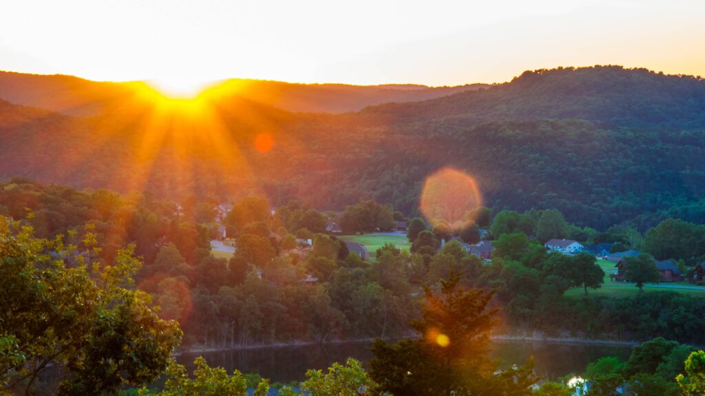 Forested hills surrounding Eureka Springs in the Ozarks at dusk
