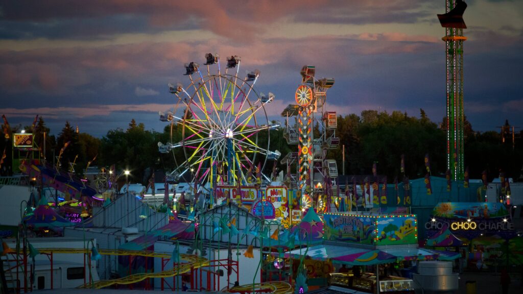 Missouri State Fair at dusk with illuminated rides